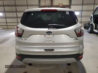 2017 Ford Escape SE with VIN 1FMCU9GD8HUB52557, listed as a Copart auction lot 48892005 with 213,217 mi miles and Salvage Title. Bid and sale history available at carsss.com. Image 6.