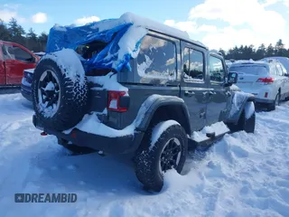 2020 Jeep Wrangler Unlimited Rubicon z VIN 1C4HJXFN5LW176104, wystawiony jako IAAI lot #41332511 z przebiegiem 70 428 mil mil oraz . Historia ofert i sprzedaży dostępna na DreamBid. Obrazek 4.
