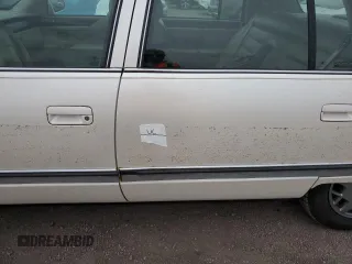 1995 Cadillac Concours z VIN 1G6KF52Y3SU270555, wystawiony jako Copart lot #76318254 z przebiegiem Nie podano mil oraz Szkody całkowita. Historia ofert i sprzedaży dostępna na DreamBid. Obrazek 12.