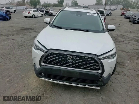 2022 Toyota Corolla Cross XLE with VIN 7MUDAAAG6NV014706, listed as a Copart auction lot 52456065 with 31,041 mi miles and Salvage title. Bid and sale history available at DreamBid. Image 12.