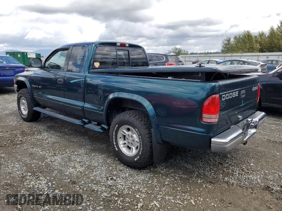 1998 Dodge Dakota SLT with VIN 1B7GG22YXWS639234, listed as a Copart auction lot 68892734 with 123,588 mi miles and Salvage Title. Bid and sale history available at carsss.com. Image 2.