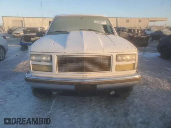 1995 GMC Sierra 1500 z VIN 2GTEK19KXS1504198, wystawiony jako Copart lot #87508215 z przebiegiem 3 210 847 mil mil oraz Szkody całkowita. Historia ofert i sprzedaży dostępna na DreamBid. Obrazek 5.