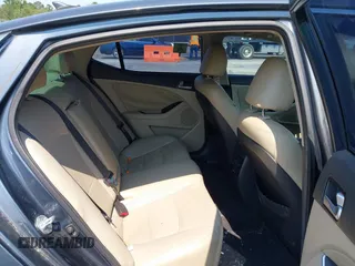 2015 Kia Optima EX z VIN KNAGN4AD8F5084764, wystawiony jako IAAI lot #42404405 z przebiegiem 158 587 mil mil oraz . Historia ofert i sprzedaży dostępna na DreamBid. Obrazek 8.