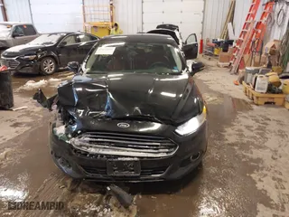 2014 Ford Fusion Titanium Hybrid with VIN 3FA6P0RUXER355654, listed as a IAAI auction lot 41611653 with 211,353 mi miles. Bid and sale history available at carsss.com. Image 12.