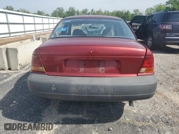 1999 Saturn SL z VIN 1G8ZH5288XZ273509, wystawiony jako Copart lot #55508215 z przebiegiem 168 946 mil mil oraz Szkoda całkowita • Salvage title. Historia ofert i sprzedaży dostępna na DreamBid. Obrazek 6.