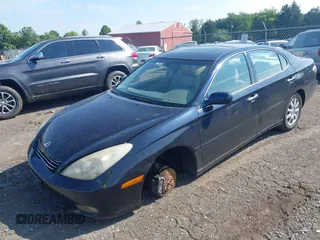 2002 Lexus ES 300 with VIN JTHBF30G020052297, listed as a IAAI auction lot 42630300 with 215,488 mi miles and . Bid and sale history available at DreamBid. Image 2.