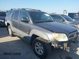 2003 Toyota 4Runner SR5 z VIN JTEZU14R630006525, wystawiony jako IAAI lot #42082239 z przebiegiem 313 223 mil mil oraz . Historia ofert i sprzedaży dostępna na DreamBid. Obrazek 1.