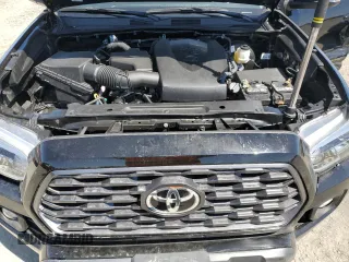 2023 Toyota Tacoma SR z VIN 3TMCZ5AN5PM533379, wystawiony jako Copart lot #55554265 z przebiegiem 31 776 mil mil oraz Szkoda całkowita • Salvage title. Historia ofert i sprzedaży dostępna na DreamBid. Obrazek 11.