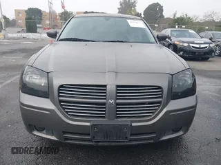 2005 Dodge Magnum RT with VIN 2D4GV58265H500284, listed as a IAAI auction lot 41194672 with 104,894 mi miles. Bid and sale history available at carsss.com. Image 12.