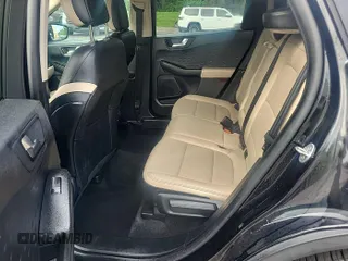 2020 Ford Escape SEL with VIN 1FMCU9H62LUA82501, listed as a IAAI auction lot 42843901 with 98,316 mi miles and . Bid and sale history available at DreamBid. Image 29.