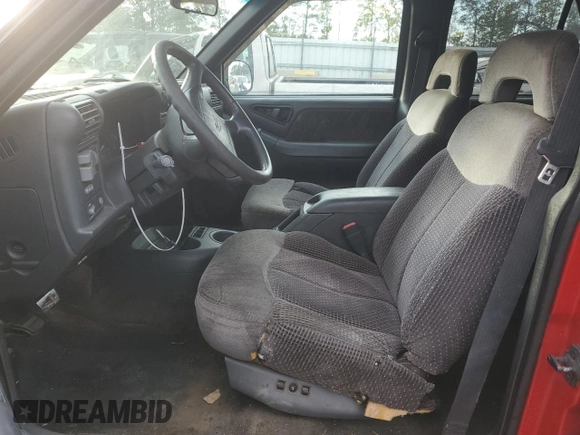 1996 GMC Jimmy SL z VIN 1GKDT13WXT2502347, wystawiony jako Copart lot #74502444 z przebiegiem 253 735 mil mil oraz Szkoda całkowita • Salvage title. Historia ofert i sprzedaży dostępna na DreamBid. Obrazek 7.