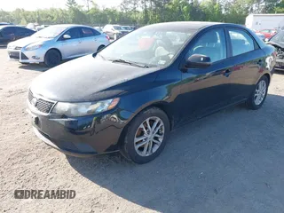 2011 Kia Forte EX with VIN KNAFU4A27B5332784, listed as a IAAI auction lot 42152645 with 237,077 mi miles. Bid and sale history available at carsss.com. Image 2.