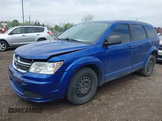 2015 Dodge Journey SE z VIN 3C4PDCAB8FT552555, wystawiony jako IAAI lot #42195398 z przebiegiem 149 503 mil mil oraz . Historia ofert i sprzedaży dostępna na DreamBid. Obrazek 2.