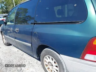 1999 Ford Windstar LX z VIN 2FMZA5141XBA22550, wystawiony jako IAAI lot #41683372 z przebiegiem 207 580 mil mil oraz . Historia ofert i sprzedaży dostępna na DreamBid. Obrazek 13.