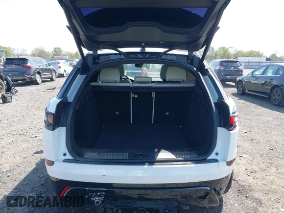 2020 Land Rover Range Rover Velar R-Dynamic S z VIN SALYK2EX4LA272072, wystawiony jako IAAI lot #41910957 z przebiegiem 63 823 mil mil oraz . Historia ofert i sprzedaży dostępna na DreamBid. Obrazek 17.