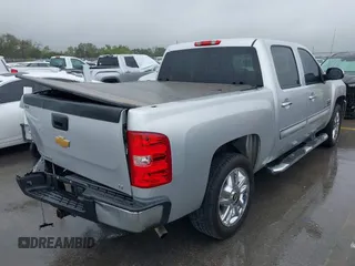 2013 Chevrolet Silverado 1500 LT with VIN 3GCPCSE06DG302775, listed as a IAAI auction lot 41903005 with 409,637 mi miles and . Bid and sale history available at DreamBid. Image 4.