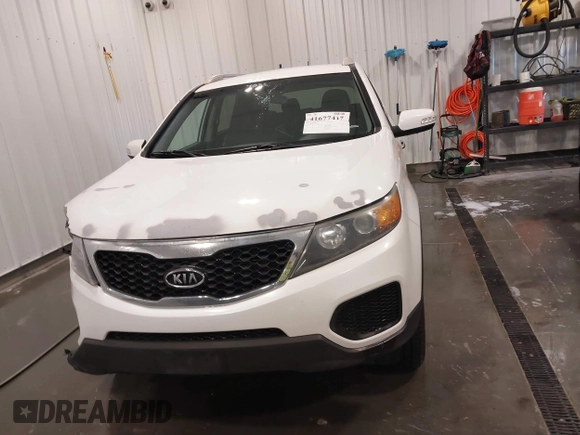 2013 Kia Sorento LX with VIN 5XYKTDA22DG310142, listed as a IAAI auction lot 41677417 with 234,661 mi miles. Bid and sale history available at carsss.com. Image 12.
