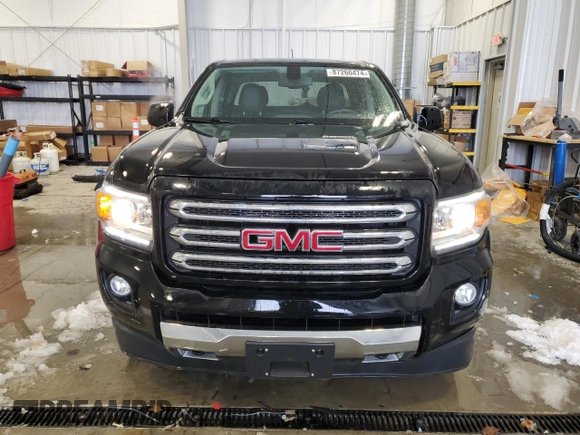 2015 GMC Canyon 4WD SLE with VIN 1GTG6BE35F1119242, listed as a Copart auction lot 87260474 with 184,286 mi miles and Clean Title. Bid and sale history available at carsss.com. Image 5.