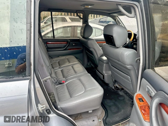 2001 Lexus LX 470 z VIN JTJHT00W313508801, wystawiony jako Copart lot #60938545 z przebiegiem 118 013 mil mil oraz Czysty tytuł • Clean title. Historia ofert i sprzedaży dostępna na DreamBid. Obrazek 6.