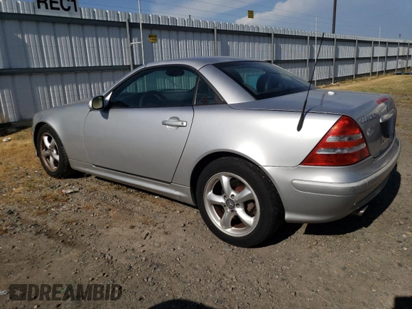 2001 Mercedes-Benz SLK-Class with VIN WDBKK65F11F178256, listed as a Copart auction lot 54979975 with 95,439 mi miles and Salvage Title. Bid and sale history available at carsss.com. Image 2.