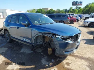 2020 Mazda CX-5 Touring z VIN JM3KFBCM2L0848233, wystawiony jako IAAI lot #42189719 z przebiegiem 80 893 mil mil oraz . Historia ofert i sprzedaży dostępna na DreamBid. Obrazek 1.