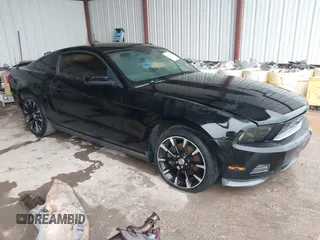 2012 Ford Mustang V6 Premium with VIN 1ZVBP8AM5C5223787, listed as a IAAI auction lot 42141944 with 73,960 mi miles. Bid and sale history available at carsss.com. Image 1.
