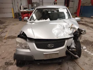 2009 Kia Rio LX with VIN KNADE223596444133, listed as a IAAI auction lot 41598865 with Not Provided miles and . Bid and sale history available at DreamBid. Image 6.