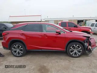 2022 Lexus RX 350 with VIN JTJHZMDAXN2058225, listed as a IAAI auction lot 42059802 with 63,407 mi miles and . Bid and sale history available at DreamBid. Image 14.