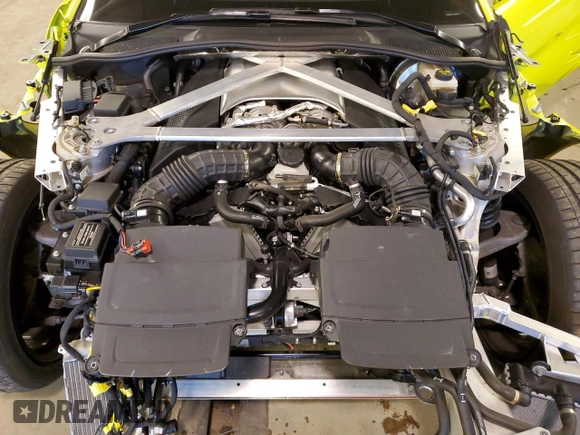 2020 Aston Martin Vantage z VIN SCFSMGAWXLGN03363, wystawiony jako Copart lot #81833084 z przebiegiem Nie podano mil oraz Szkoda całkowita • Salvage title. Historia ofert i sprzedaży dostępna na DreamBid. Obrazek 11.