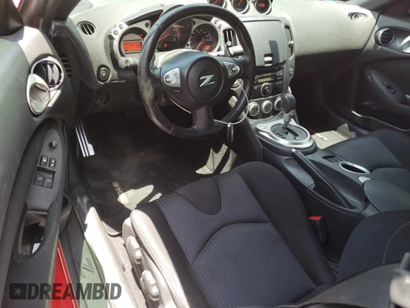 2010 Nissan 370Z Touring with VIN JN1AZ4EH4AM505004, listed as a Copart auction lot 57652374 with 86,689 mi miles and Salvage Title. Bid and sale history available at carsss.com. Image 8.