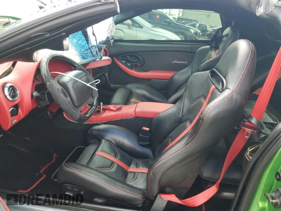 2001 Pontiac Firebird Formula with VIN 2G2FV22G412115819, listed as a Copart auction lot 70310714 with 203,067 mi miles and Salvage title. Bid and sale history available at DreamBid. Image 7.