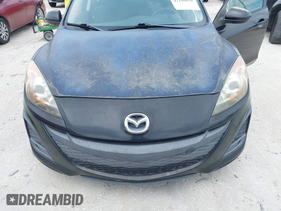 2011 Mazda Mazda3 i Touring with VIN JM1BL1VFXB1472772, listed as a IAAI auction lot 42180030 with 128,438 mi miles. Bid and sale history available at carsss.com. Image 6.