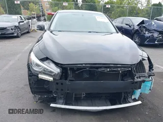 2015 Infiniti Q50 z VIN JN1BV7AP3FM336566, wystawiony jako IAAI lot #42349544 z przebiegiem 84 077 mil mil oraz . Historia ofert i sprzedaży dostępna na DreamBid. Obrazek 6.