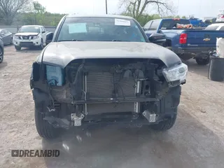 2023 Toyota Tacoma 4WD SR with VIN 3TYCZ5AN4PT170688, listed as a IAAI auction lot 41998053 with 20,770 mi miles. Bid and sale history available at carsss.com. Image 13.