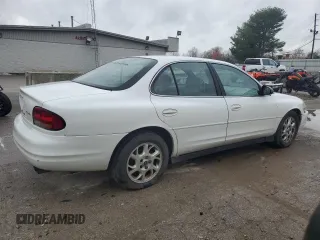 2000 Oldsmobile Intrigue GX z VIN 1G3WH52H8YF257547, wystawiony jako Copart lot #79727714 z przebiegiem 132 156 mil mil oraz Szkody całkowita. Historia ofert i sprzedaży dostępna na DreamBid. Obrazek 3.