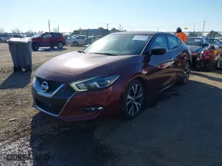 2016 Nissan Maxima 3.5 Platinum with VIN 1N4AA6AP3GC902379, listed as a IAAI auction lot 41454987 with 245,563 mi miles. Bid and sale history available at carsss.com. Image 2.