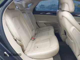 2013 Lincoln MKZ z VIN 3LN6L2G90DR827936, wystawiony jako IAAI lot #42259036 z przebiegiem 145 304 mil mil oraz . Historia ofert i sprzedaży dostępna na DreamBid. Obrazek 8.