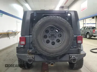 2008 Jeep Wrangler Unlimited Rubicon with VIN 1J4GA69198L591203, listed as a Copart auction lot 45772815 with 109,708 mi miles and Salvage Title. Bid and sale history available at carsss.com. Image 6.