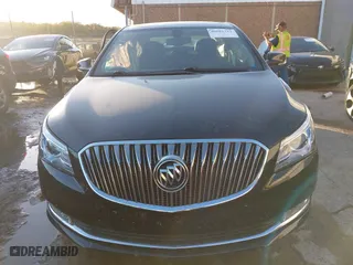 2016 Buick LaCrosse Sport Touring with VIN 1G4G45G36GF285693, listed as a IAAI auction lot 40681312 with 64,249 mi miles. Bid and sale history available at carsss.com. Image 12.