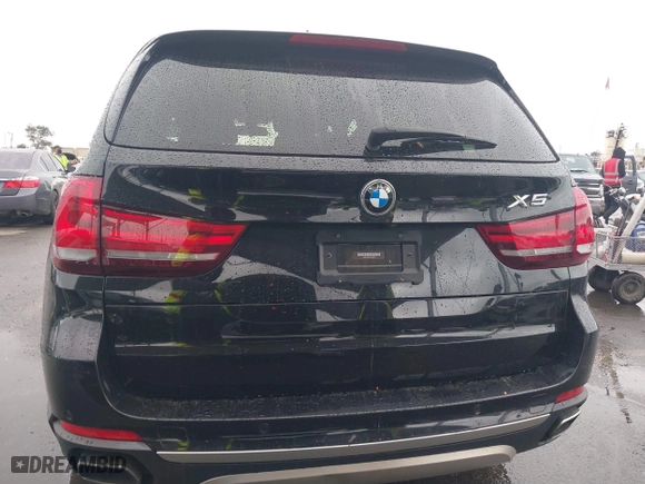 2018 BMW X5 xDrive40e iPerformance with VIN 5UXKT0C54J0V99573, listed as a IAAI auction lot 41490567 with 50,650 mi miles. Bid and sale history available at carsss.com. Image 17.