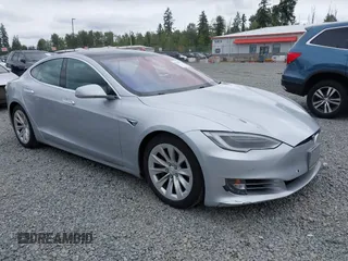 2017 Tesla Model S 60 with VIN 5YJSA1E11HF217633, listed as a IAAI auction lot 42586913 with 152,987 mi miles and . Bid and sale history available at DreamBid. Image 1.