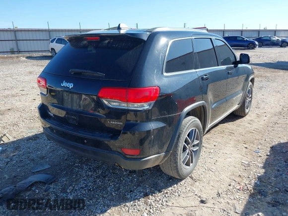 2019 Jeep Grand Cherokee Upland with VIN 1C4RJEAG3KC558147, listed as a IAAI auction lot 42142470 with 133,797 mi miles and . Bid and sale history available at DreamBid. Image 4.
