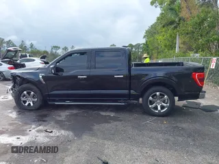 2021 Ford F-150 XL z VIN 1FTEW1CP7MKD20266, wystawiony jako IAAI lot #41618910 z przebiegiem 80 194 mil mil oraz . Historia ofert i sprzedaży dostępna na DreamBid. Obrazek 14.