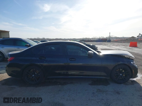2021 BMW 3 Series 330i z VIN 3MW5R1J05M8B84800, wystawiony jako IAAI lot #41818906 z przebiegiem Nie podano mil oraz . Historia ofert i sprzedaży dostępna na DreamBid. Obrazek 13.