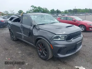 2023 Dodge Durango R/T z VIN 1C4SDJCT0PC695209, wystawiony jako IAAI lot #42277316 z przebiegiem 8 487 mil mil oraz . Historia ofert i sprzedaży dostępna na DreamBid. Obrazek 1.