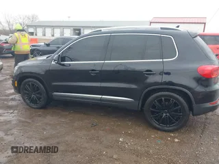 2012 Volkswagen Tiguan SE with VIN WVGAV7AX0CW602713, listed as a IAAI auction lot 41558520 with 95,678 mi miles and . Bid and sale history available at DreamBid. Image 14.