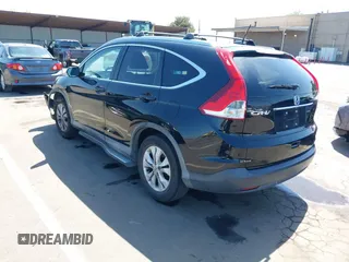 2014 Honda CR-V EX-L with VIN 2HKRM3H71EH551594, listed as a IAAI auction lot 42028963 with 117,506 mi miles and . Bid and sale history available at carsss.com. Image 3.