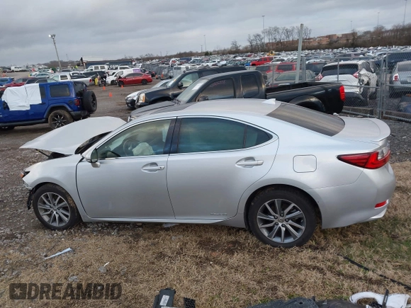 2016 Lexus ES 300h z VIN JTHBW1GGXG2109451, wystawiony jako IAAI lot #41168128 z przebiegiem 101 603 mil mil oraz . Historia ofert i sprzedaży dostępna na DreamBid. Obrazek 14.