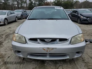 2002 Hyundai Accent GL with VIN KMHCG35CX2U210657, listed as a Copart auction lot 85131504 with 91,354 mi miles and Clean Title. Bid and sale history available at carsss.com. Image 5.
