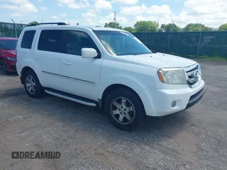 2010 Honda Pilot Touring z VIN 5FNYF4H99AB004420, wystawiony jako IAAI lot #42674793 z przebiegiem 202 843 mil mil oraz . Historia ofert i sprzedaży dostępna na DreamBid. Obrazek 1.